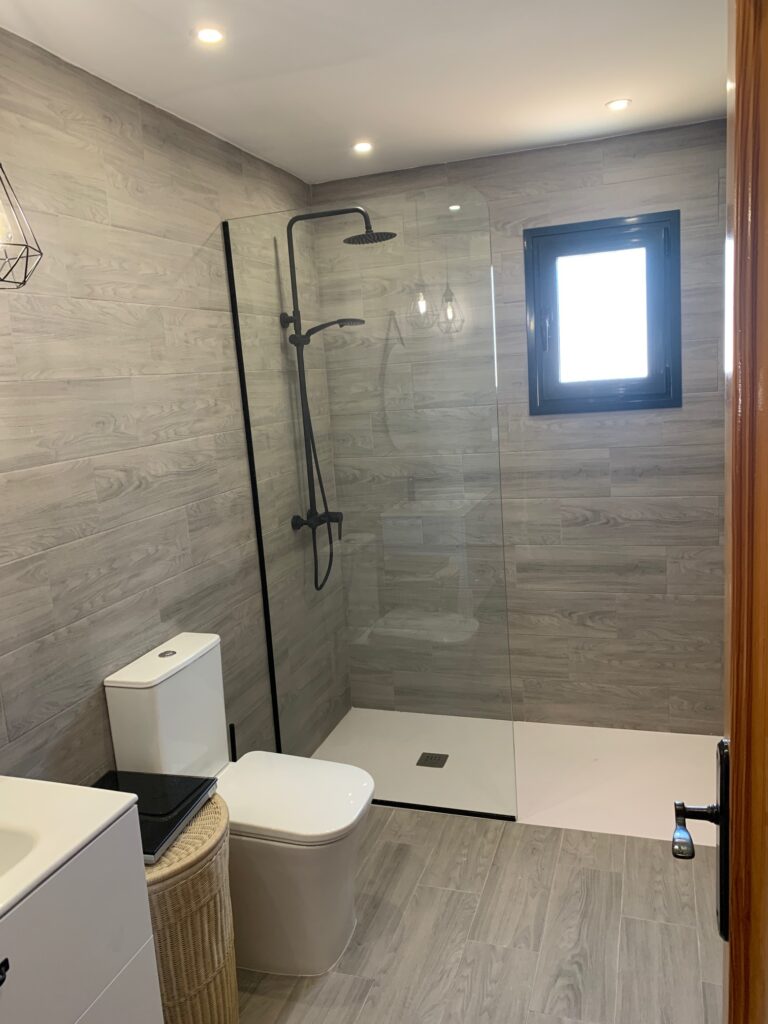 Premium bathroom renovation showcasing exquisite modern design and craftsmanship. Immerse yourself in luxury with our expertly curated spaces, blending sophistication and comfort seamlessly. Elevate your bathroom to new heights with our bespoke services.