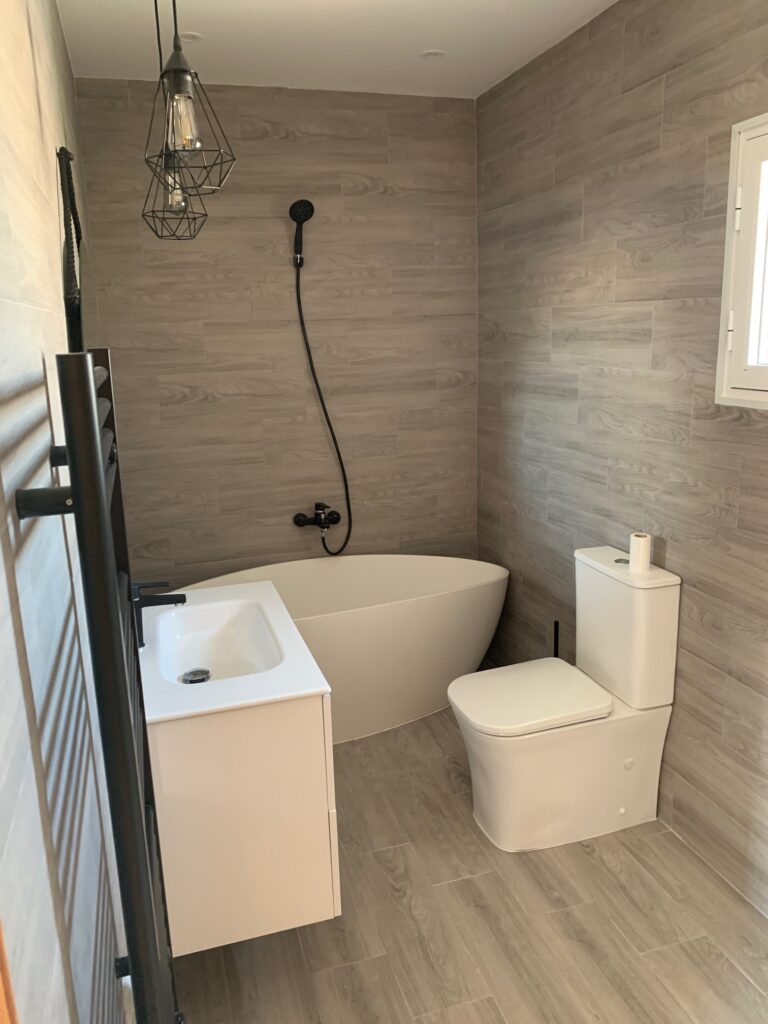 Premium bathroom renovation showcasing exquisite modern design and craftsmanship. Immerse yourself in luxury with our expertly curated spaces, blending sophistication and comfort seamlessly. Elevate your bathroom to new heights with our bespoke services.